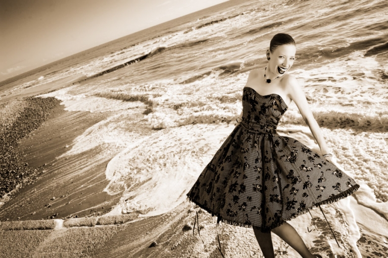 Lindsey in 50's dress on beach